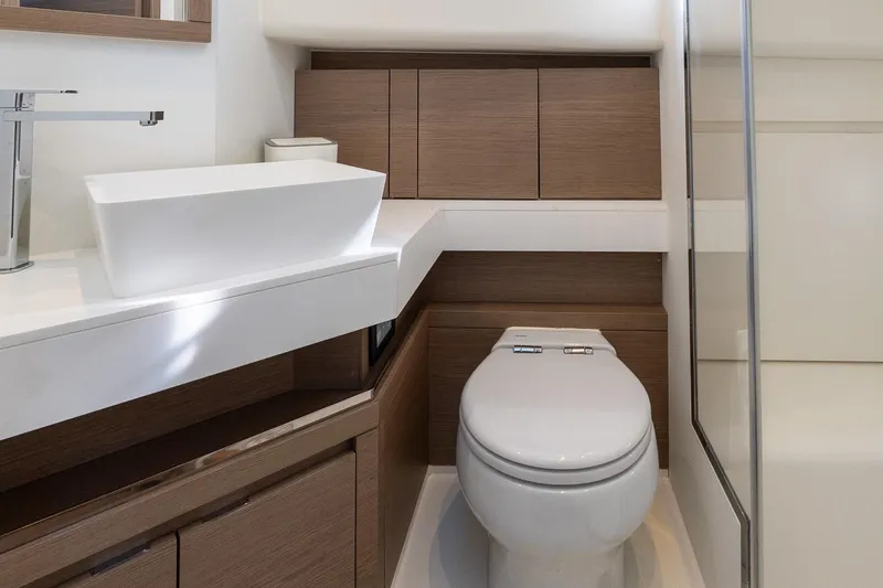  Yacht Photos Pics Modern bathroom interior on 2023 Pardo Yachts 43, featuring sleek fixtures and wood accents.