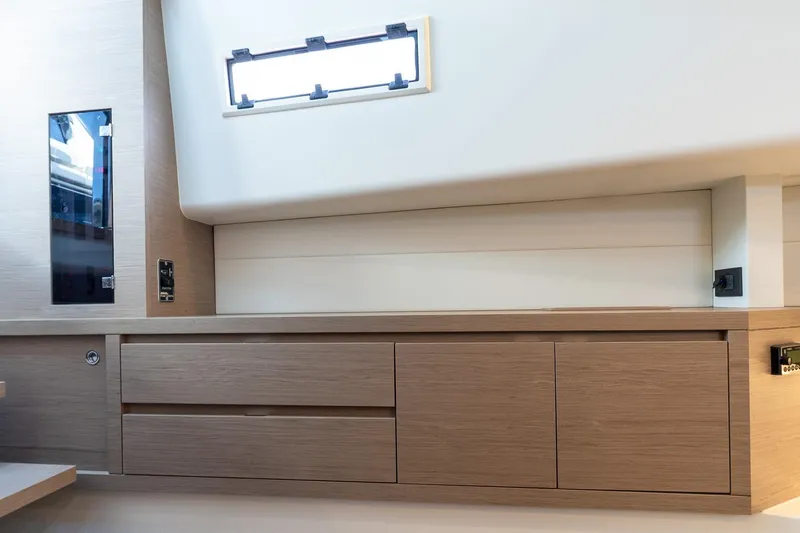  Yacht Photos Pics Interior of 2023 Pardo Yachts 43, featuring sleek wooden cabinetry and modern design elements.