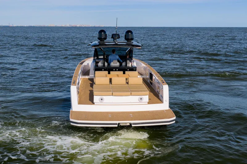  Yacht Photos Pics 2023 Pardo Yachts 43 cruising on open water, rear view.