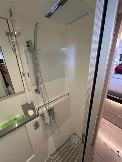 About Time Yacht Photos Pics Modern shower in 2021 Leopard 45 yacht, featuring sleek design and chrome fixtures.