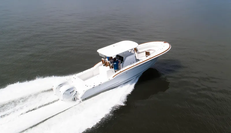  Yacht Photos Pics 2025 Buddy Davis 34 Center Console boat cruising on open water.