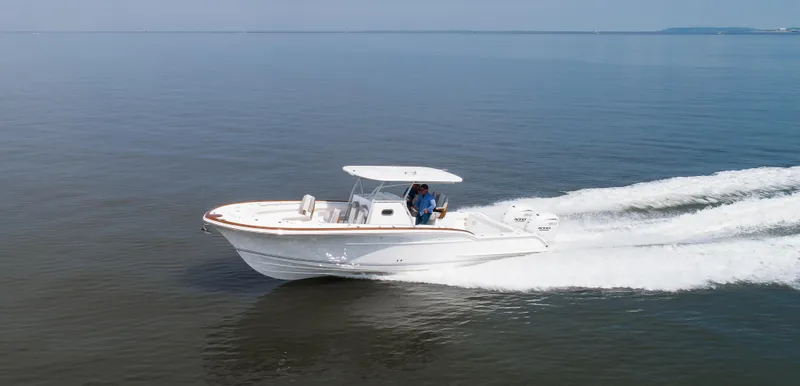 Yacht Photos Pics 2025 Buddy Davis 34 Center Console boat cruising on open water.