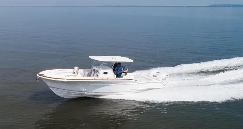  Yacht Photos Pics 2025 Buddy Davis 34 Center Console boat cruising on open water.