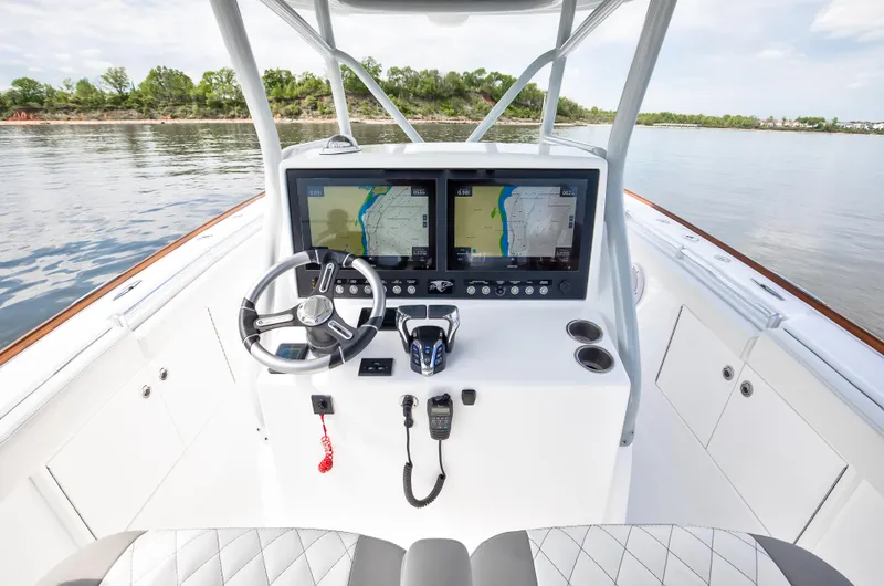  Yacht Photos Pics 2025 Buddy Davis 34 Center Console boat helm with dual navigation screens.
