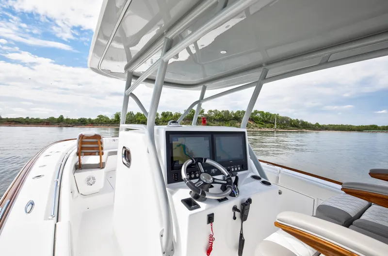  Yacht Photos Pics 2025 Buddy Davis 34 Center Console boat interior with modern navigation system.