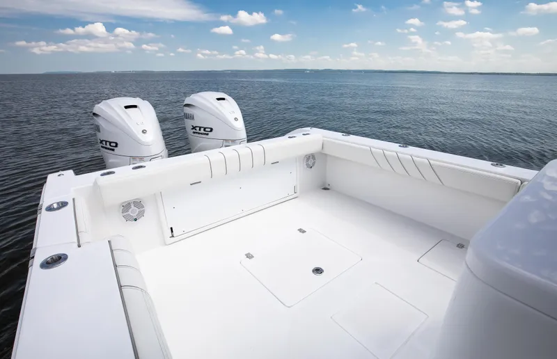  Yacht Photos Pics 2025 Buddy Davis 34 Center Console boat with twin engines on open water.