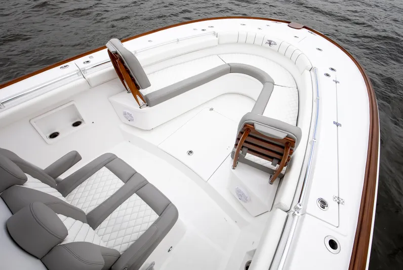  Yacht Photos Pics 2025 Buddy Davis 34 Center Console boat with sleek seating and elegant design on the water.