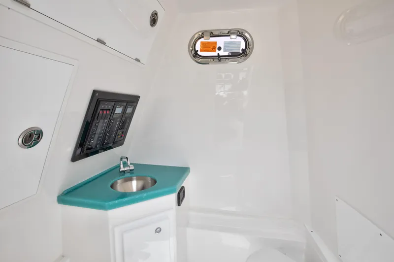  Yacht Photos Pics 2025 Buddy Davis 34 Center Console interior with sink and control panel.