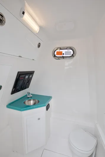  Yacht Photos Pics 2025 Buddy Davis 34 Center Console boat interior with sink and toilet.