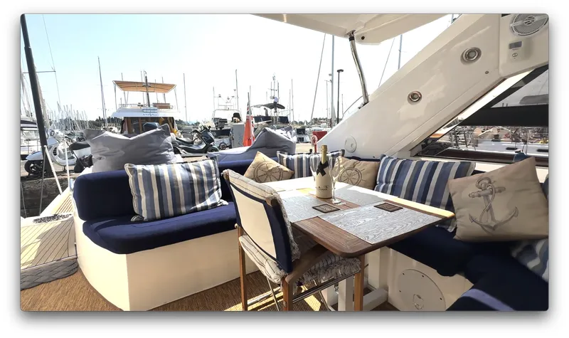  Yacht Photos Pics Luxurious 2006 Sunseeker Portofino 53 yacht interior with elegant seating and nautical decor.