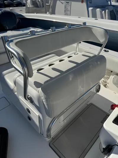  Yacht Photos Pics 2013 Contender 35 ST boat with white cushioned seating and stainless steel frame.