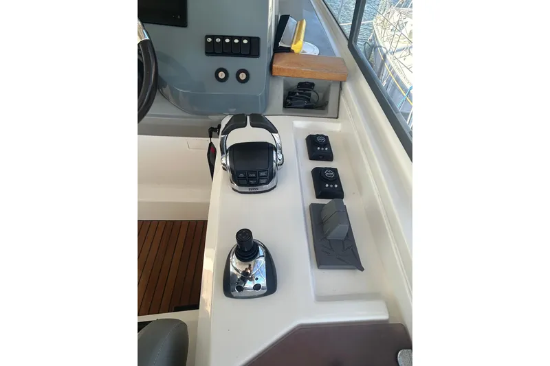  Yacht Photos Pics Control panel of a 2012 Beneteau Gran Turismo 44 yacht, featuring modern navigation equipment.