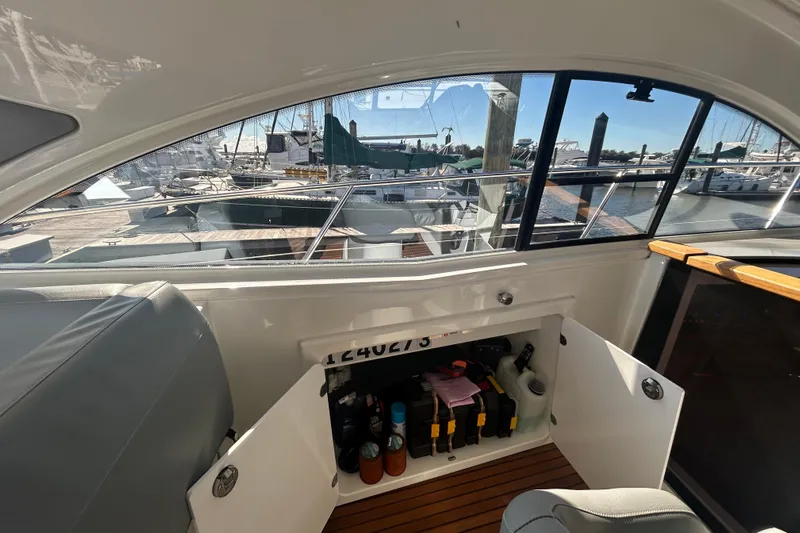  Yacht Photos Pics Interior view of a 2012 Beneteau Gran Turismo 44 yacht, showcasing storage compartment.