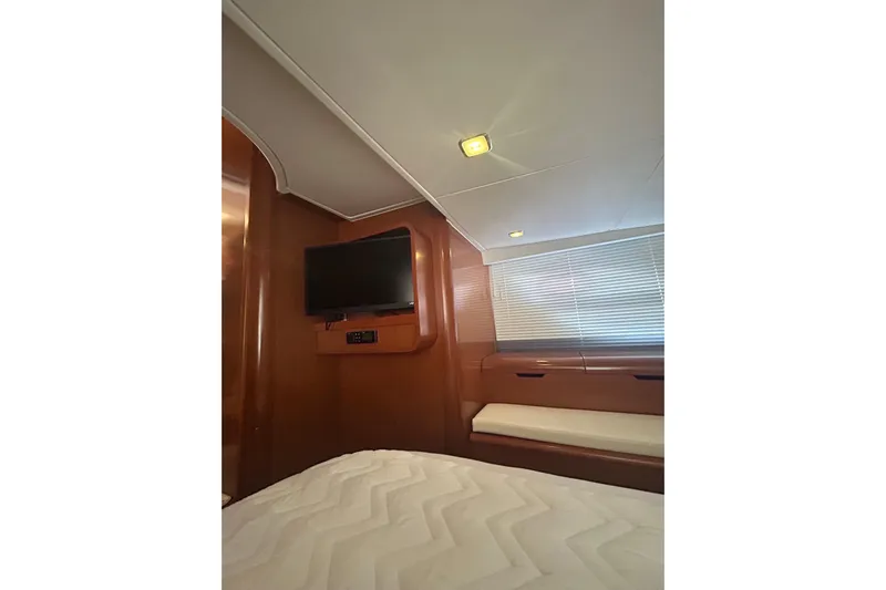  Yacht Photos Pics Interior of 2012 Beneteau Gran Turismo 44 yacht with TV and seating area.