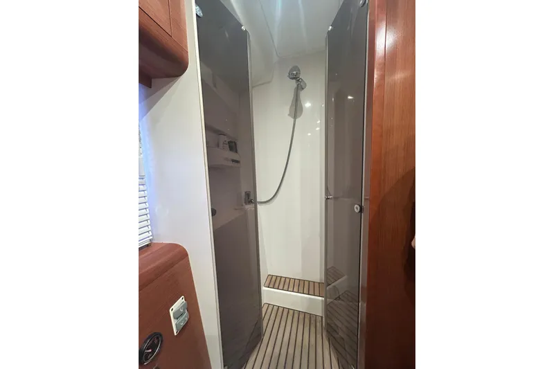  Yacht Photos Pics Shower area in 2012 Beneteau Gran Turismo 44 yacht with wooden flooring.