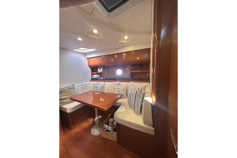  Yacht Photos Pics Luxurious interior of 2012 Beneteau Gran Turismo 44 yacht with cozy seating area.