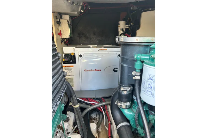  Yacht Photos Pics Engine room of 2012 Beneteau Gran Turismo 44 with Cummins Onan generator.