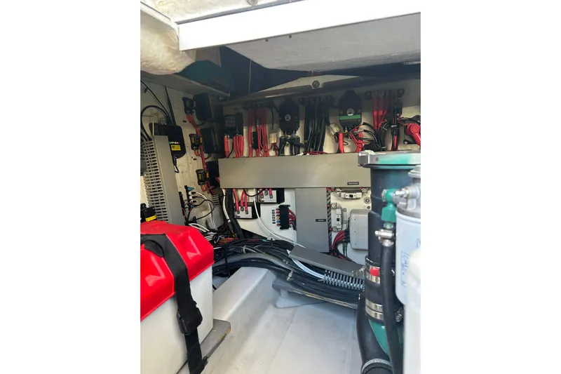  Yacht Photos Pics Engine room of 2012 Beneteau Gran Turismo 44 with wiring and equipment.