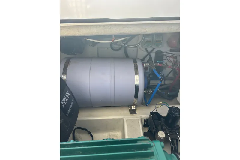  Yacht Photos Pics Engine compartment of a 2012 Beneteau Gran Turismo 44 with visible components and wiring.