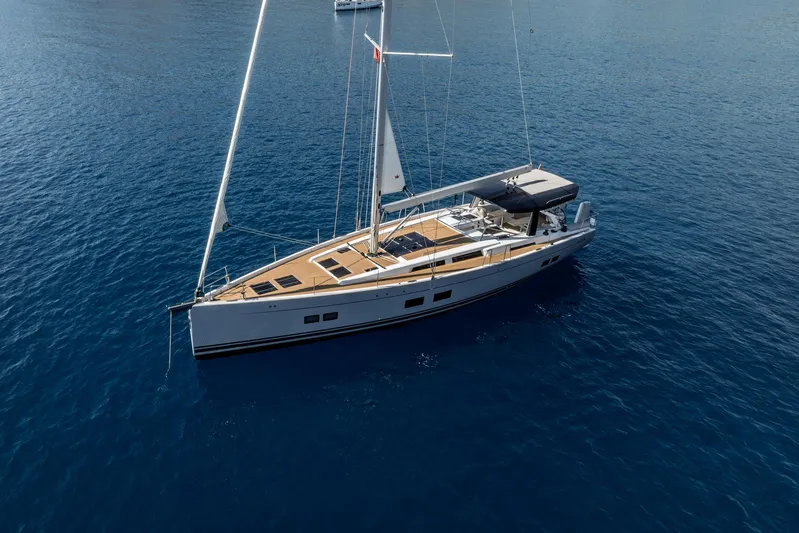 Hanse 588 Yacht Photos Pics 2024 Hanse 588 yacht sailing on calm blue waters.