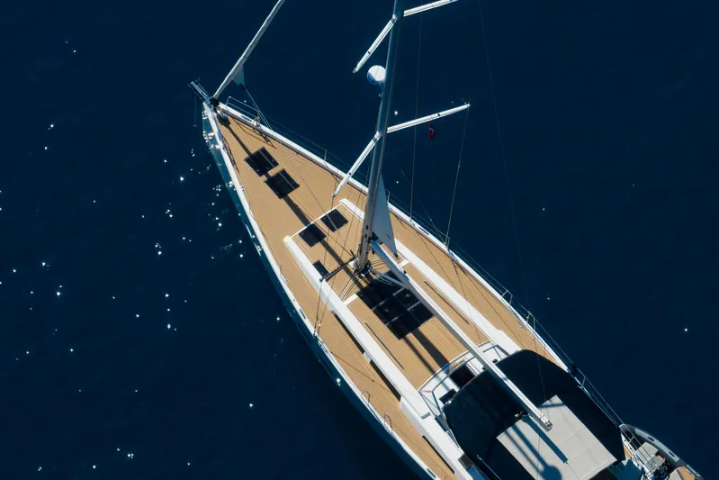 Hanse 588 Yacht Photos Pics Aerial view of 2024 Hanse 588 yacht sailing on deep blue water.