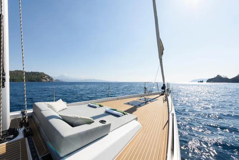 Hanse 588 Yacht Photos Pics 2024 Hanse 588 yacht sailing on open sea with clear skies and luxurious deck.