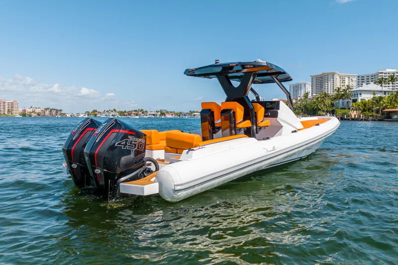 Novielli Yacht Photos Pics 2026 Novielli Veloche 349 boat with dual engines on a sunny day.