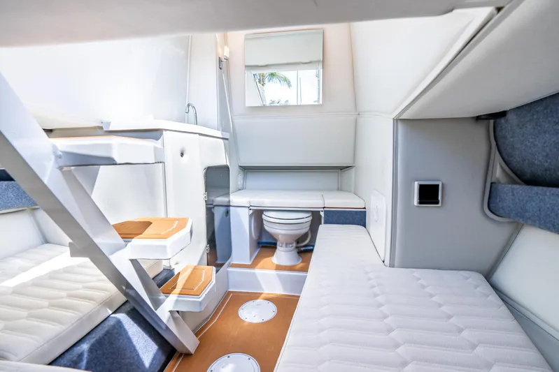Novielli Yacht Photos Pics Interior of 2026 Novielli Veloche 349 boat, featuring compact cabin with seating and toilet.