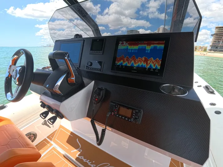 Novielli Yacht Photos Pics Helm of Novielli Veloche 349 boat, featuring advanced navigation technology, 2026 model.