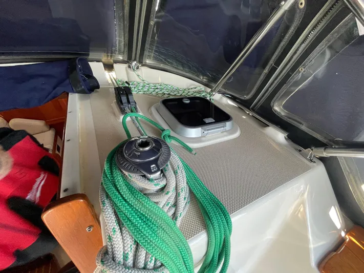  Yacht Photos Pics Island Packet 380 sailboat deck with ropes and hatch, 2002 model.