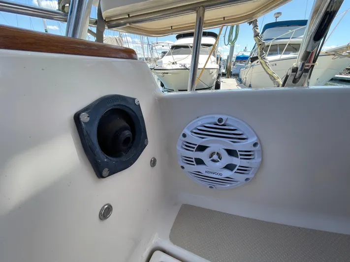  Yacht Photos Pics Cockpit view of a 2002 Island Packet 380 sailboat with speaker and port.