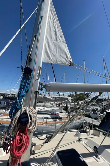  Yacht Photos Pics Sailboat Island Packet 380, 2002 model, docked with sails and rigging visible under clear blue sky.