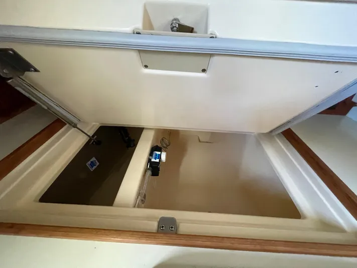  Yacht Photos Pics Open storage compartment on a 2002 Island Packet 380 sailboat.