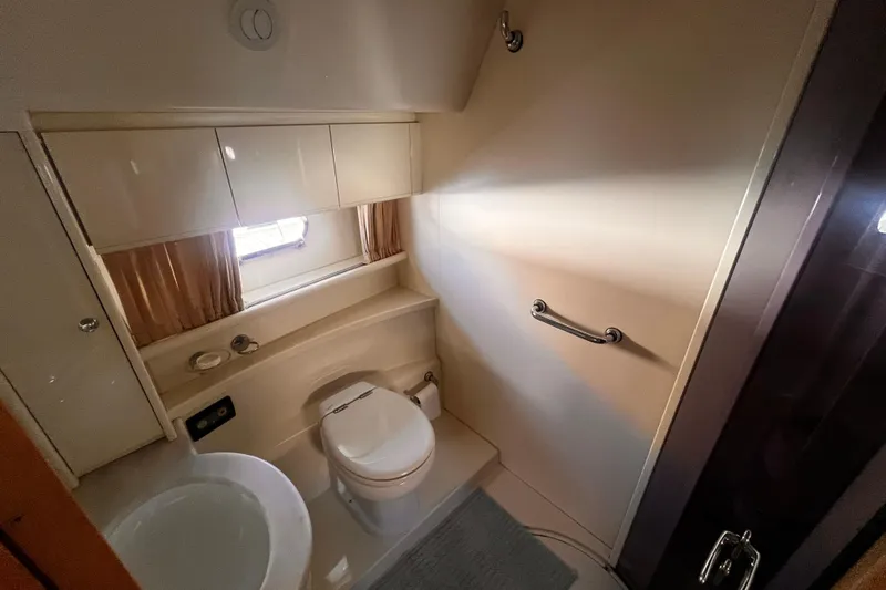 Resilient Sea Yacht Photos Pics Luxurious bathroom in 2004 Ferretti Yachts 530, featuring modern fixtures and elegant design.