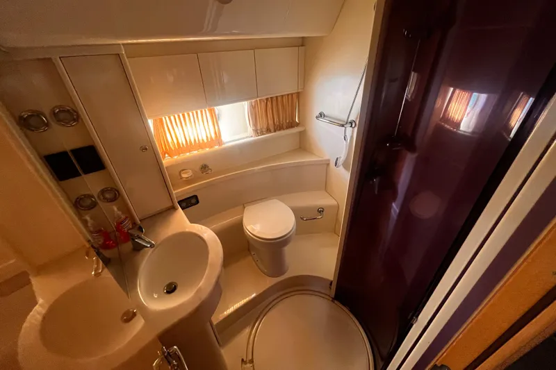 Resilient Sea Yacht Photos Pics Luxurious bathroom in 2004 Ferretti Yachts 530, featuring modern fixtures and elegant design.