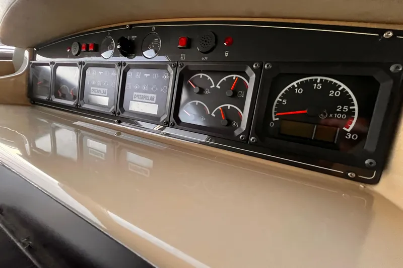 Resilient Sea Yacht Photos Pics Control panel of a 2004 Ferretti Yachts 530 with Caterpillar gauges.