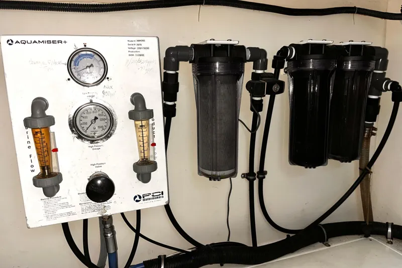 Resilient Sea Yacht Photos Pics Water filtration system in a 2004 Ferretti Yachts 530, featuring Aquamiser+ controls and gauges.