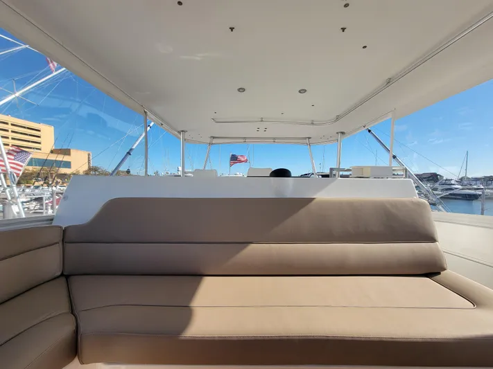  Yacht Photos Pics Luxurious seating on 2005 Ocean Yachts 57 Super Sport, docked at marina.