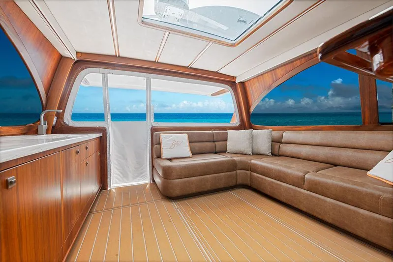 Jet Stream Yacht Photos Pics Luxurious interior of 2018 Spencer Yachts Jet Boat with ocean view and plush seating.