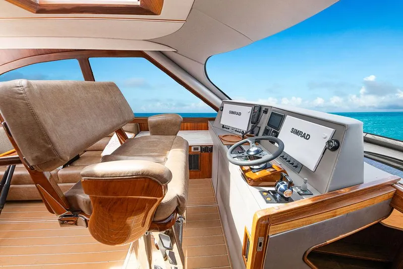 Jet Stream Yacht Photos Pics 2018 Spencer Yachts Jet Boat cockpit with modern controls and ocean view.
