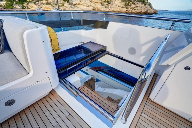 Apricity Yacht Photos Pics 2024 Azimut S8 yacht interior with sleek staircase and luxurious seating.