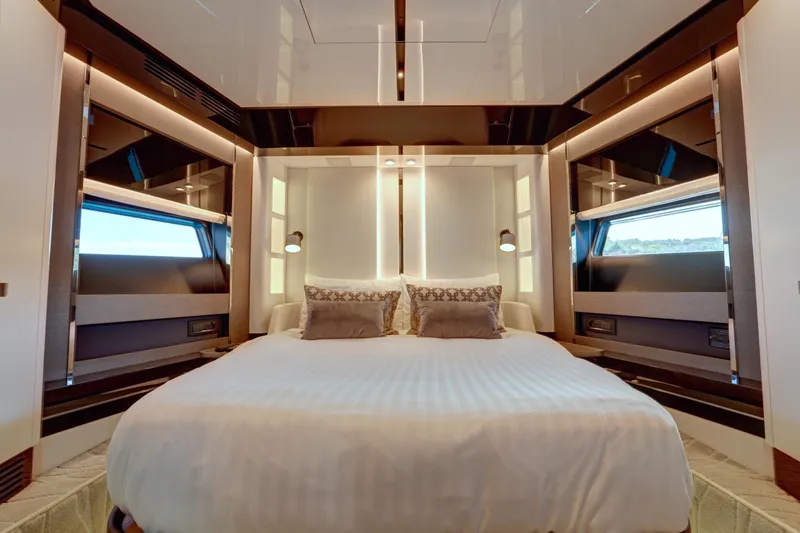 Apricity Yacht Photos Pics Luxurious bedroom interior of 2024 Azimut S8 yacht with modern design and ambient lighting.
