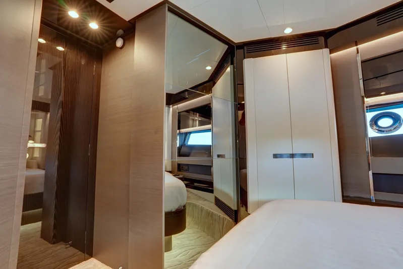 Apricity Yacht Photos Pics Luxurious interior of 2024 Azimut S8 yacht cabin with modern design and elegant furnishings.