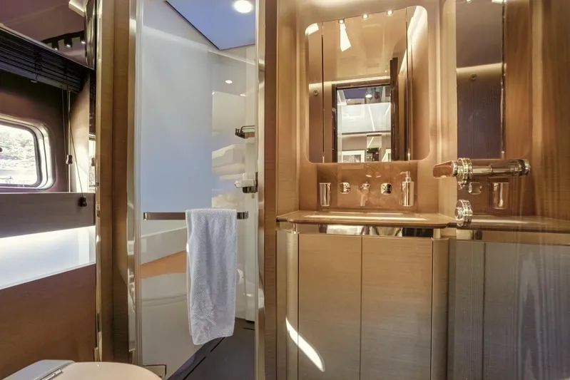 Apricity Yacht Photos Pics Luxurious bathroom interior of 2024 Azimut S8 yacht with modern fixtures and elegant design.