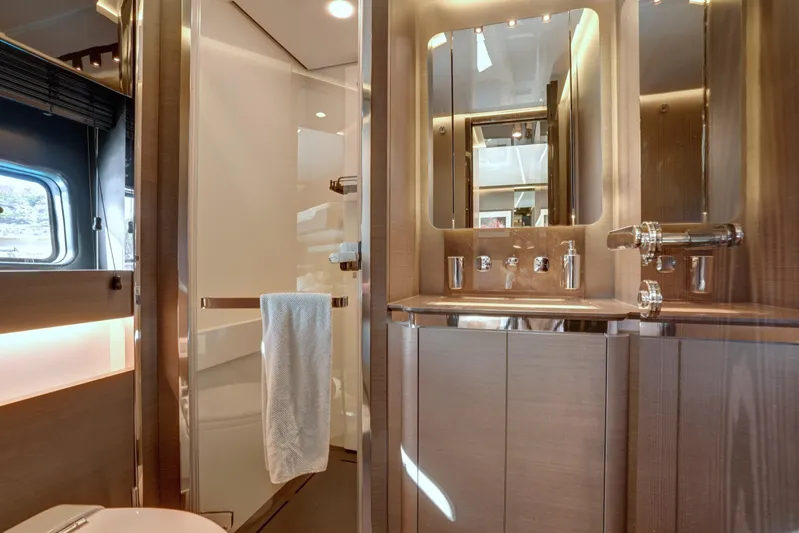 Apricity Yacht Photos Pics Luxurious bathroom interior of 2024 Azimut S8 yacht, featuring modern fixtures and elegant design.