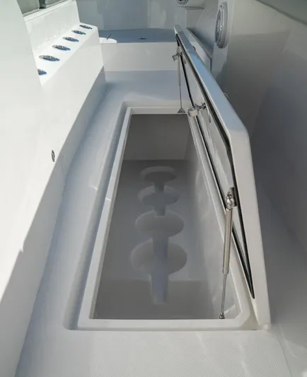  Yacht Photos Pics 2026 Front Runner 37 Catamaran with open storage compartment on deck.