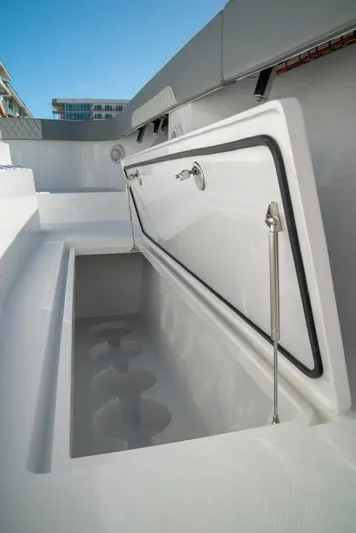  Yacht Photos Pics Open storage compartment on 2026 Front Runner 37 Catamaran, showcasing spacious interior design.