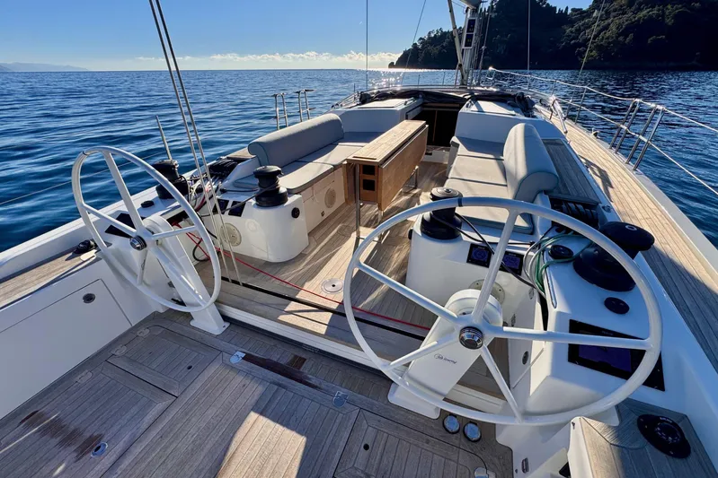  Yacht Photos Pics Italia Yachts 15.98, 2021 model, elegant deck view with dual steering wheels.