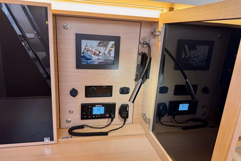  Yacht Photos Pics Italia Yachts 15.98 interior control panel with framed sailing photo, 2021 model.