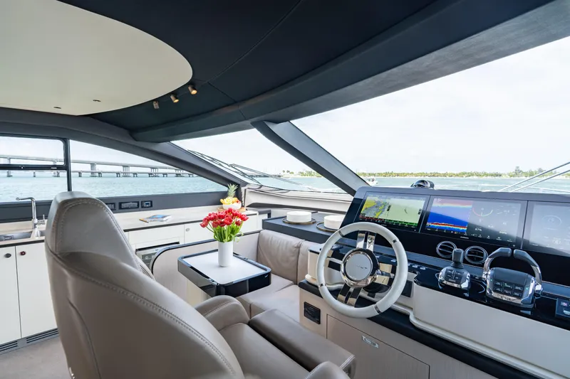 Euphoria Yacht Photos Pics Luxurious interior of 2022 Azimut 78 yacht with modern helm and panoramic views.